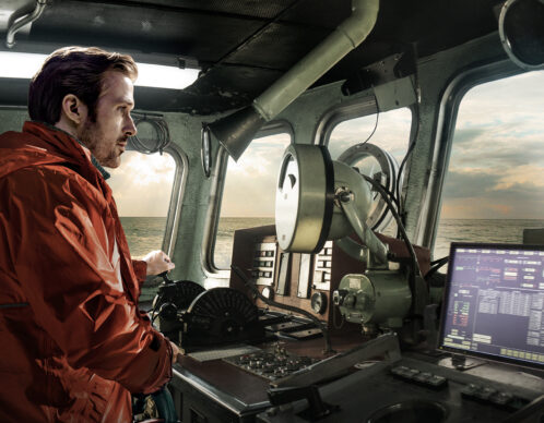 Giant waves break near the lighthouse at peggy's cove, nova scotia.